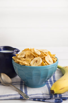 Breakfast Cereal and Bananas in a Blue Bowl