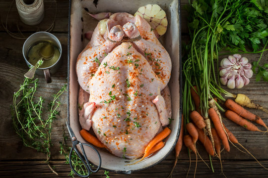 Ingredients for roasted chicken with vegetables and herbs