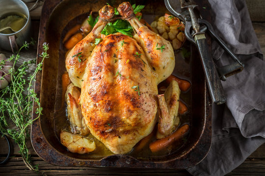Crispy roasted golden chicken with thyme and garlic