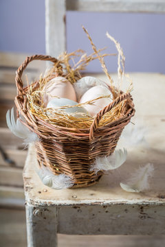 Healthy free range eggs in wicker basket