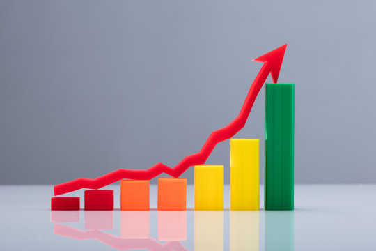 Multi Colored Business Graph With Arrow Sign - Powered by Adobe