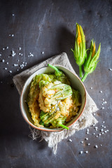 Homemade fried zucchini flower served with salt