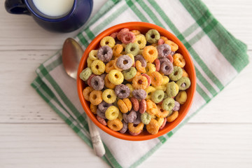 Bowl of Fruit Cereal on a Rustic Wooden Table