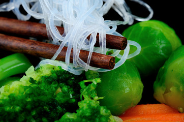 chinese noodle with vegetable on table