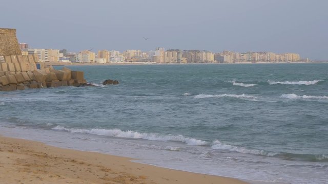 Waves reaching a beach