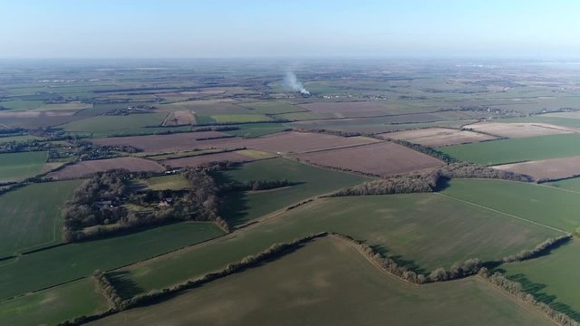 Aerial bird view flight over typical English countryside landscape in general this rural area or countryside is a geographic area that is located outside towns and cities area located Kent near Dover