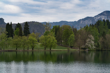 Fototapeta na wymiar spring lake and mountain views
