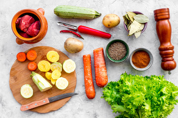 Diet vegetarian vegan food. Ratatouille or vegetable ragout. Stone table background top view