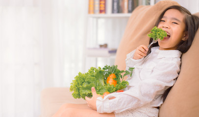 Asian cute  girl eats fresh salad  ,healthy eating concept