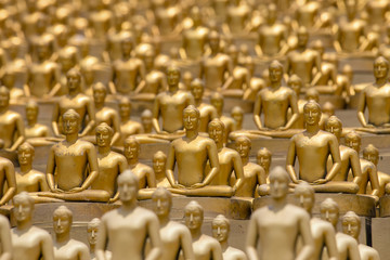 Obraz premium Million golden Buddha figurine in Wat Phra Dhammakaya. Buddhist temple in Bangkok, Thailand