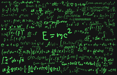 Blackboard inscribed with scientific formulas and calculations in physics and mathematics. Can illustrate scientific topics tied to quantum mechanics, relativity theory and any scientific calculations