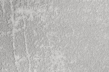 Cement color surface with fine stones, uneven texture, old, abstract background for print design