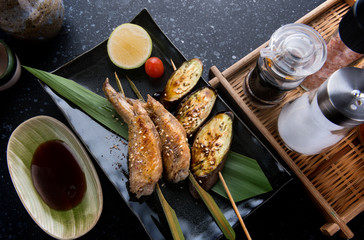 Grill chicken wing with salt seasoning.