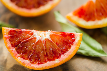Sliced oranges  on the wooden table. Citrus sinensis orange