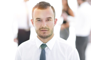portrait of successful businessman on blurred background