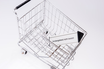 Einkaufswagen mit Schild - Vorübergehend nicht besetzt
