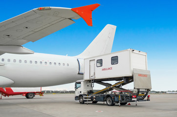 Airplane at the airport with loading ladder for disabled people. Ambulatory for people with limited...
