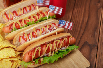 Hot dogs on wooden background