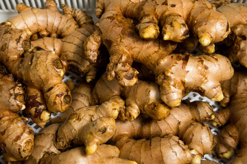 Fresh organic ginger background texture top viwe