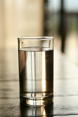 A glass of pure water on table