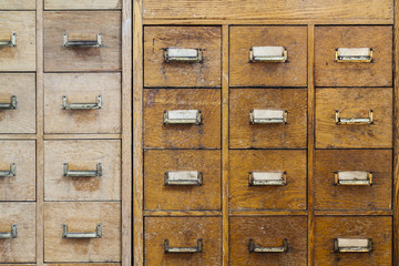 Old rustic cabinet with small compartments