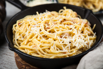 Spaghetti carbonara with egg and pancetta