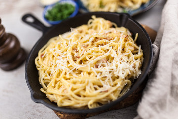 Spaghetti carbonara with egg and pancetta