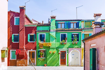 bright picturesque houses on the island of Burano, Venice