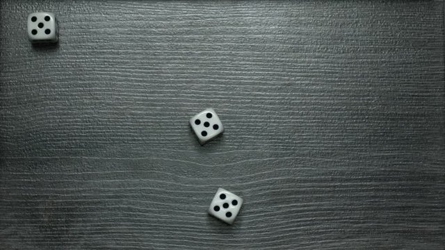 Poker Dice rolling three of a kind on five