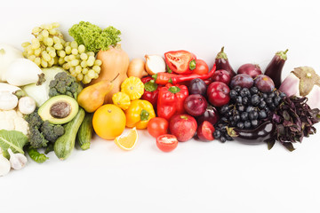 Set of multicolored fresh raw vegetables and fruits, isolated