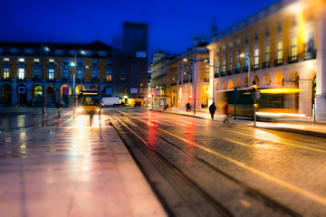 Old European city street and night traffic light