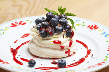 Meringue cake Pavlova with blueberry