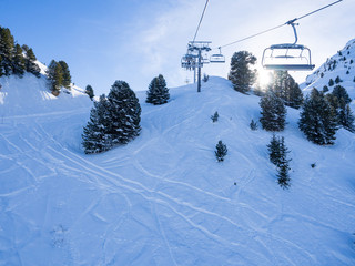 Mountain ski resort with snow in winter. Alps, France. panoramic view of mountains on a clear sunny winter day, Meribel