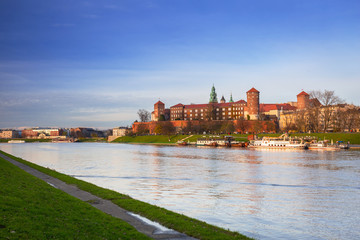 Fototapeta na wymiar The Royal Wawel Castle in Krakow at Vistula river, Poland