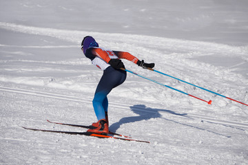 group of male skiers going uphill front view during Championship on cross country skiing