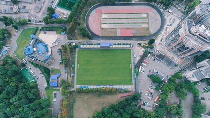 Aerial view of the football field. Sport. Green grass. Run. Stadium for running.