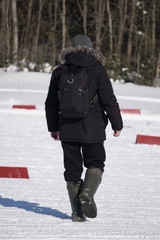 Man With Rucksack Walk Snow Forest Young Traveler Outdoor Winter Pine Woods .