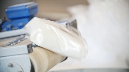 Production line with packed sugar at the sugar refinery