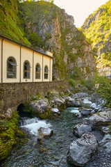 Fototapeta na wymiar Hydroelectric power station in the mountains of Italy.