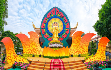 Ho Chi Minh City, January 3, 2018: Statue Buddha o stage decorated magnificently in festival of Amitabha Buddha is spiritual culture of the Vietnamese in Ho Chi Minh City, Vietnam.
