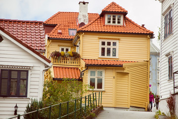 Facades of the colorful wooden houses in Bergen. Famous colored houses and street in Bergen Norway - architecture background