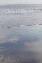 Volcanic beach at low tide taken on Bali island
