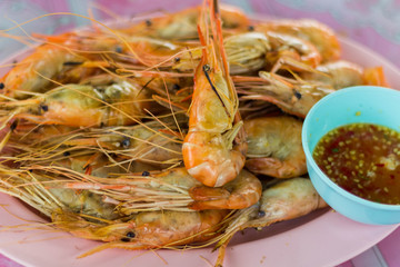 Fresh shrimp grilled from the river Bring to eat with spicy sauce, Available at riverside garden restaurant.