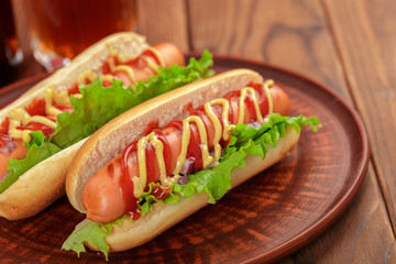 Hot dogs on wooden background
