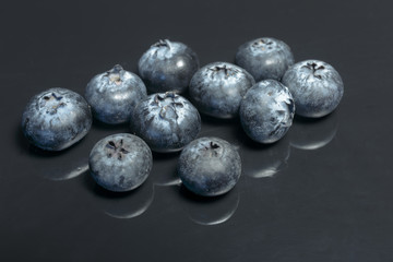 Blueberry closeup isolated on a dark background, Ready to Eat, Vegan food.