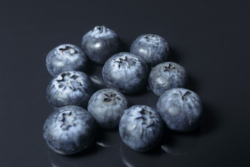 Blueberry closeup isolated on a dark background, Ready to Eat, Vegan food.