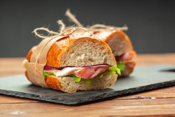 sandwich on a wooden table