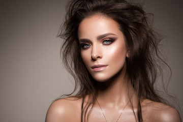 Fototapeta premium Beautiful woman with professional make up and hairstyle