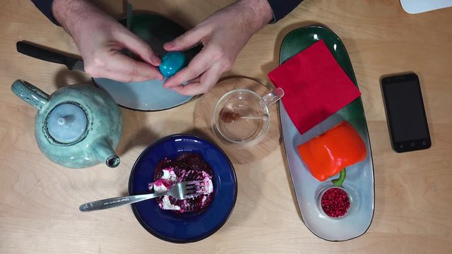 Top view with breakfast, tea, egg, salad and smartphone.
