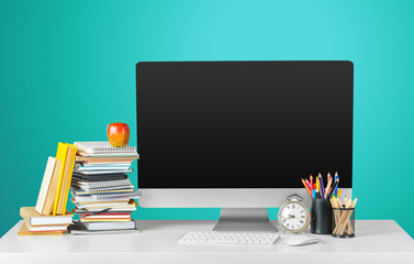 Workplace with modern desktop computer on table